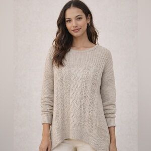 Cozy-chic neutral knit sweater with a subtle allover sparkle cable knit detail